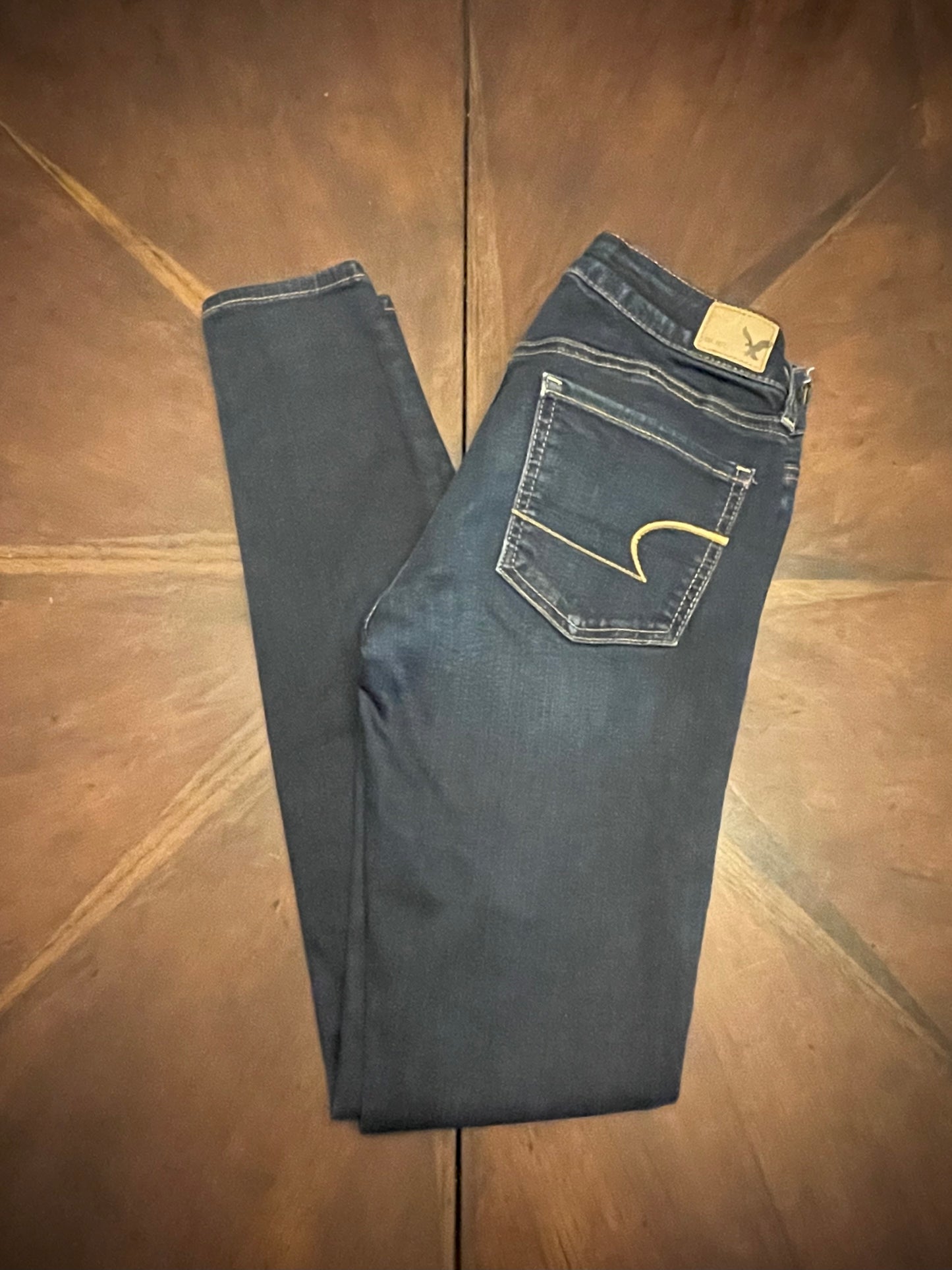 American Eagle Low-Rise Skinny Blue Jeans with Orange Stitching
