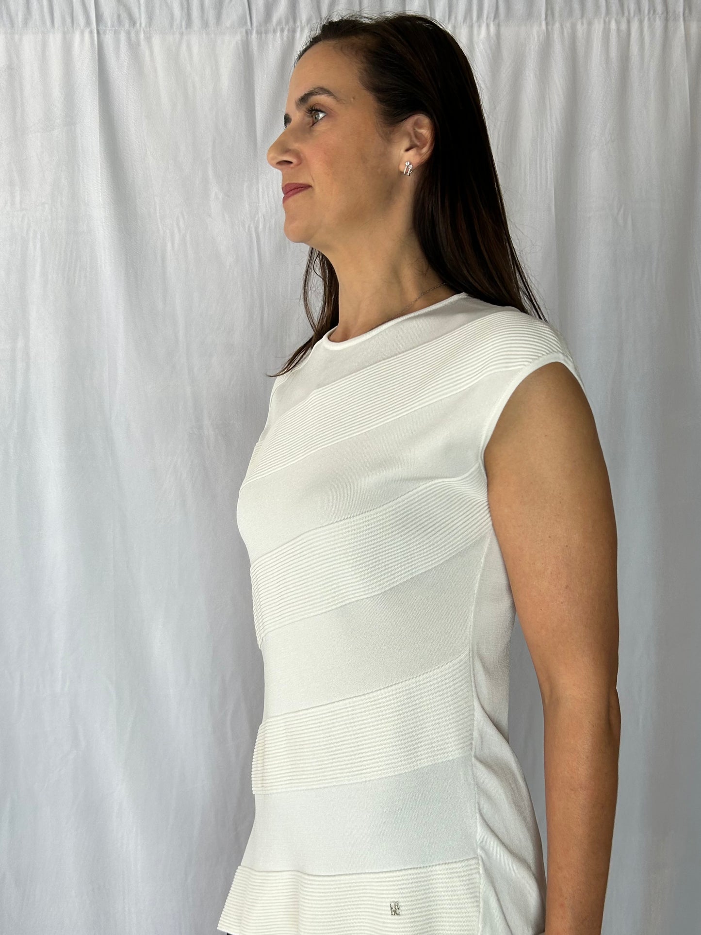 Carolina Herrera Ivory Sleeveless Jewel Sweater with Assymetrical Hemn